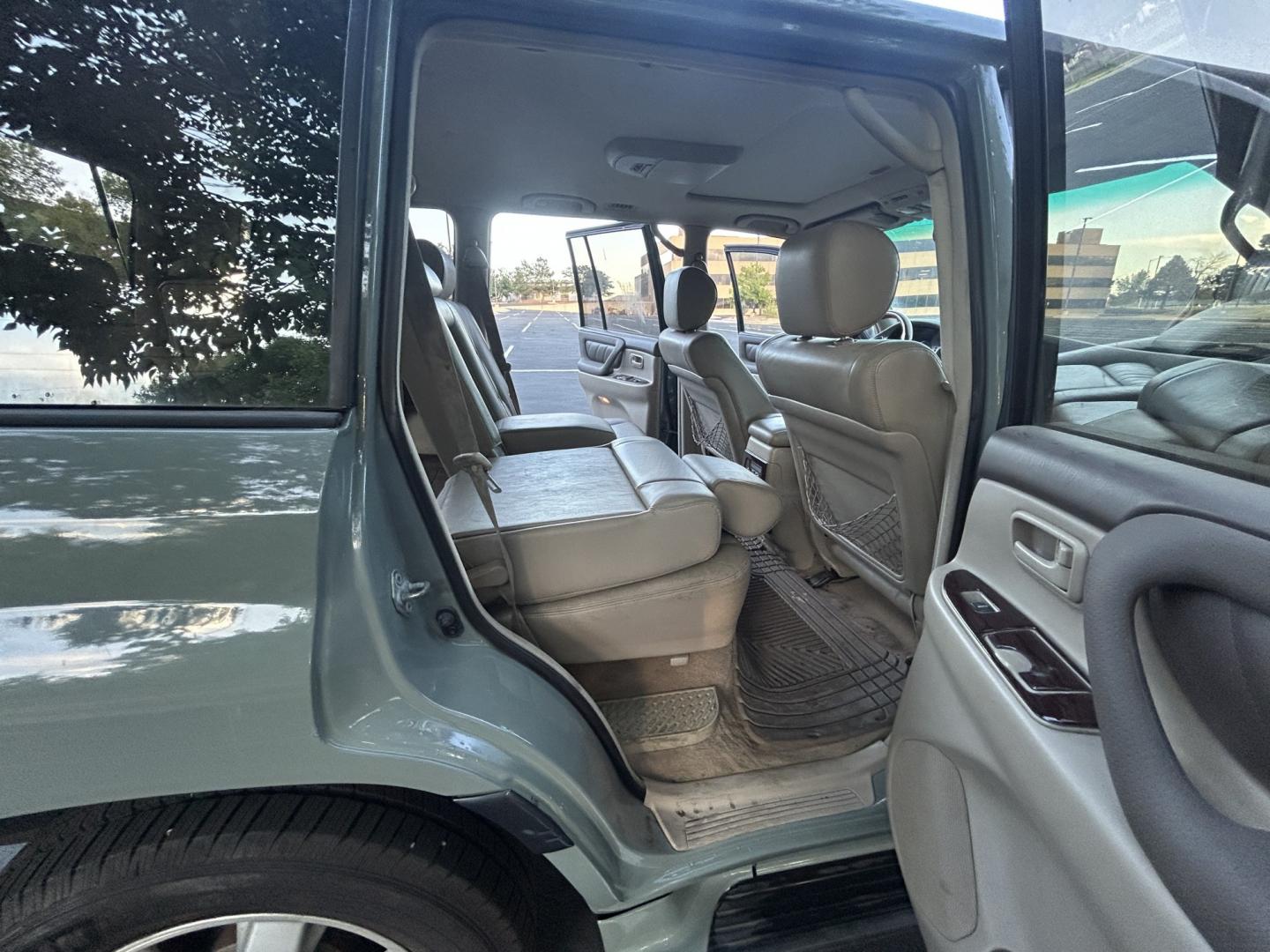 2003 Blue /Gray Toyota Land Cruiser 4WD (JTEHT05J932) with an 4.7L V8 DOHC 32V engine, 5A OD transmission, located at 2510 47th St. Suite 200, Boulder, CO, 80301, (303) 641-0333, 40.026196, -105.243217 - This Amazing, Toyota Serviced Land Cruiser is a Recent Acquisition by Boulder Motors of Boulder Colorado. Corwin Toyota Boulder Completed a Fresh Synthetic Service and Inspection 12/16/2025 At Our Listed Price This great 2003 Land Cruiser qualifies for our Certified Limited Drivetrain Warranty.- Photo#16