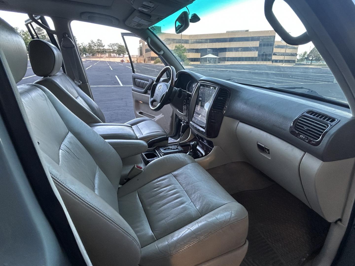 2003 Blue /Gray Toyota Land Cruiser 4WD (JTEHT05J932) with an 4.7L V8 DOHC 32V engine, 5A OD transmission, located at 2510 47th St. Suite 200, Boulder, CO, 80301, (303) 641-0333, 40.026196, -105.243217 - This Amazing, Toyota Serviced Land Cruiser is a Recent Acquisition by Boulder Motors of Boulder Colorado. Corwin Toyota Boulder Completed a Fresh Synthetic Service and Inspection 12/16/2025 At Our Listed Price This great 2003 Land Cruiser qualifies for our Certified Limited Drivetrain Warranty.- Photo#18