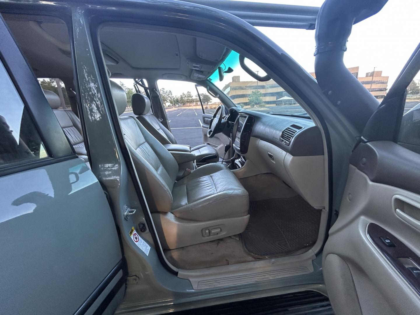 2003 Blue /Gray Toyota Land Cruiser 4WD (JTEHT05J932) with an 4.7L V8 DOHC 32V engine, 5A OD transmission, located at 2510 47th St. Suite 200, Boulder, CO, 80301, (303) 641-0333, 40.026196, -105.243217 - This Amazing, Toyota Serviced Land Cruiser is a Recent Acquisition by Boulder Motors of Boulder Colorado. Corwin Toyota Boulder Completed a Fresh Synthetic Service and Inspection 12/16/2025 At Our Listed Price This great 2003 Land Cruiser qualifies for our Certified Limited Drivetrain Warranty.- Photo#17